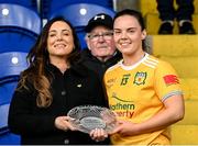 13 April 2025; Bronagh Devlin of Antrim receives the Player of the Match award from Christine McIntyre, Senior Partnerships and Events Manager, Lidl Ireland and Northern Ireland, following the 2025 Lidl Ladies National Football League Division 4 Final between Antrim and Fermanagh at St. Tiernach’s Park, Clones, Co. Monaghan. Photo by Matt Browne /Sportsfile  Photo by Matt Browne/Sportsfile *** NO REPRODUCTION FEE ***