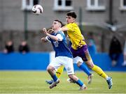 13 April 2025; Leon Daly of Limerick District League  in action against Todd Hynes of Wexford Football League during the FAI Oscar Traynor Inter-League Cup final match between Limerick District League and Wexford Football League at Jackman Park in Limerick. Photo by Michael P Ryan/Sportsfile