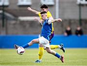 13 April 2025; Leon Daly of Limerick District League  in action against Todd Hynes of Wexford Football League during the FAI Oscar Traynor Inter-League Cup final match between Limerick District League and Wexford Football League at Jackman Park in Limerick. Photo by Michael P Ryan/Sportsfile