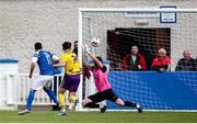 13 April 2025; Wexford Football League goalkeeper Jason McGuire makes a save from Joel Coustrain of Limerick District League during the FAI Oscar Traynor Inter-League Cup final match between Limerick District League and Wexford Football League at Jackman Park in Limerick. Photo by Michael P Ryan/Sportsfile
