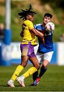 13 April 2025; Raphael Abidoye of Wexford Football League in action against Adam Lipper of Limerick District League during the FAI Oscar Traynor Inter-League Cup final match between Limerick District League and Wexford Football League at Jackman Park in Limerick. Photo by Michael P Ryan/Sportsfile