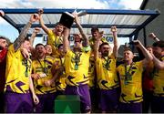 13 April 2025; Wexford Football League captain Alan Rhodes lifts the cup after the FAI Oscar Traynor Inter-League Cup final match between Limerick District League and Wexford Football League at Jackman Park in Limerick. Photo by Michael P Ryan/Sportsfile