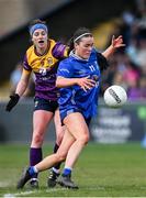 13 April 2025; Lauren McVeety of Cavan is tackled by Róisín Murphy of Wexford during the Lidl Ladies National Football League Division 3 final match between Cavan and Wexford at Integral GAA Grounds in Drogheda, Louth. Photo by Shauna Clinton/Sportsfile