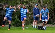14 April 2025; Senior coach Jacques Nienaber with players, from left, Cian Healy, Rónan Kelleher and Will Connors during Leinster Rugby squad training at UCD in Dublin. Photo by Piaras Ó Mídheach/Sportsfile
