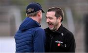 13 April 2025; Laois manager Justin McNulty shares a joke with linesman Noel Mooney before the Leinster GAA Football Senior Championship quarter-final match between Louth and Laois at Cedral St Conleth's Park in Newbridge, KiIdare. Photo by Piaras Ó Mídheach/Sportsfile