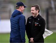 13 April 2025; Laois manager Justin McNulty shares a joke with linesman Noel Mooney before the Leinster GAA Football Senior Championship quarter-final match between Louth and Laois at Cedral St Conleth's Park in Newbridge, KiIdare. Photo by Piaras Ó Mídheach/Sportsfile