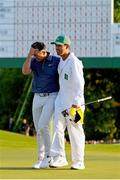 13 April 2025; Rory McIlroy of Northern Ireland and his caddie Harry Diamond celebrate on the 18th green after his playoff victory in the final round of the Masters Tournament at Augusta National Golf Club in Georgia, USA. Photo by Katie Goodale/Imagn Images via Sportsfile