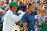 13 April 2025; Rory McIlroy of Northern Ireland and his caddie Harry Diamond celebrate on the 18th green after his playoff victory in the final round of the Masters Tournament at Augusta National Golf Club in Georgia, USA. Photo by Peter Casey/Imagn Images via Sportsfile
