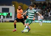 14 April 2025; Aaron Greene of Shamrock Rovers in action against Milan Mbeng of Cork City during the SSE Airtricity Men's Premier Division match between Shamrock Rovers and Cork City at Tallaght Stadium in Dublin. Photo by Stephen McCarthy/Sportsfile