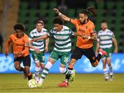 14 April 2025; Victor Ozhianvuna of Shamrock Rovers is tackled by Milan Mbeng of Cork City during the SSE Airtricity Men's Premier Division match between Shamrock Rovers and Cork City at Tallaght Stadium in Dublin. Photo by Stephen McCarthy/Sportsfile