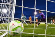 14 April 2025; Aaron Greene of Shamrock Rovers scores his side's first goal past Cork City goalkeeper Tein Troost during the SSE Airtricity Men's Premier Division match between Shamrock Rovers and Cork City at Tallaght Stadium in Dublin. Photo by Stephen McCarthy/Sportsfile