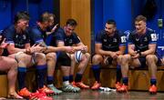 11 April 2025; Diarmuid Mangan of Leinster, centre, is congratulated by teammates, from left, Tadhg Furlong, Joe McCarthy, RG Snyman, Max Deegan and Josh van der Flier in the dressingroom after making his European debut in the Investec Champions Cup quarter-final match between Leinster and Glasgow Warriors at the Aviva Stadium in Dublin. Photo by Brendan Moran/Sportsfile