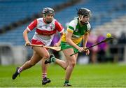 13 April 2025; Faye Mulrooney of Offaly in action against Niamh Quinn of Derry during the Very National Camogie League Division 2A final match between between Derry and Offaly at FBD Semple Stadium in Thurles, Tipperary. Photo by Tom Beary/Sportsfile