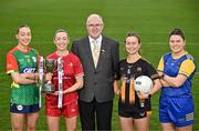 15 April 2025; In attendance at the launch of the TG4 Leinster LGFA Championships is Leinster  LGFA President Arthur Corrigan, with Junior footballers from left, Roisin Bailey of Carlow, Shannen McLoughlin of Louth, Jennifer O’Keeffe of Kilkenny and Eimear O’Brien of Longford at Parnell Park in Dublin. Photo by Sam Barnes/Sportsfile