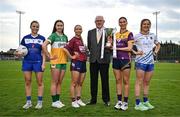 15 April 2025; In attendance at the launch of the TG4 Leinster LGFA Championships is Leinster LGFA President Arthur Corrigan, with Intermediate footballers from left, Andrea Moran of Laois, Michele Mann of Offaly, Fiona Coyle of Westmeath, Aisling Halligan of Wexford, and Sarah Jane Winders of Wicklow at Parnell Park in Dublin. Photo by Sam Barnes/Sportsfile