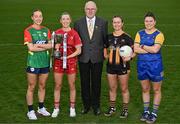 15 April 2025; In attendance at the launch of the TG4 Leinster LGFA Championships is Leinster  LGFA President Arthur Corrigan, with Junior footballers from left, Roisin Bailey of Carlow, Shannen McLoughlin of Louth, Jennifer O’Keeffe of Kilkenny and Eimear O’Brien of Longford at Parnell Park in Dublin. Photo by Sam Barnes/Sportsfile
