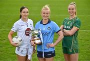 15 April 2025; In attendance at the launch of the are senior footballers from left, Laoise Lenehan of Kildare, Carla Rowe of Dublin, holding the Mary Ramsbottom Memorial Cup, and Aoibhín Cleary of Meath at Parnell Park in Dublin. Photo by Sam Barnes/Sportsfile