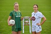 15 April 2025; Senior footballers Aoibhín Cleary of Meath and Laoise Lenehan of Kildare with the Mary Ramsbottom Memorial Cup at the launch of the TG4 Leinster LGFA Championships at Parnell Park in Dublin. Photo by Sam Barnes/Sportsfile