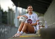 15 April 2025; Laoise Lenehan of Kildare poses for a portrait with the Mary Ramsbottom Memorial Cup at the launch of the TG4 Leinster LGFA Championships at Parnell Park in Dublin. Photo by Sam Barnes/Sportsfile