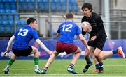 16 April 2025; Eoin Garvey of Metro in action against Killian James of North Midlands during the BearingPoint Shane Horgan Cup Round 5 match between Metro and North Midlands at Energia Park in Dublin. Photo by Shauna Clinton/Sportsfile