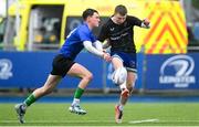 16 April 2025; Eoin Garvey of Metro in action against Aidan Tamming of North Midlands during the BearingPoint Shane Horgan Cup Round 5 match between Metro and North Midlands at Energia Park in Dublin. Photo by Shauna Clinton/Sportsfile