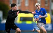 16 April 2025; Cian Keogh of North Midlands in action against Ryan Kilpatrick of Metro during the BearingPoint Shane Horgan Cup Round 5 match between Metro and North Midlands at Energia Park in Dublin. Photo by Shauna Clinton/Sportsfile