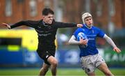 16 April 2025; Cian Keogh of North Midlands in action against Ryan Kilpatrick of Metro during the BearingPoint Shane Horgan Cup Round 5 match between Metro and North Midlands at Energia Park in Dublin. Photo by Shauna Clinton/Sportsfile
