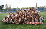 16 April 2025; Midlands players, including captains Eabha O'Mahony and Mia Rowan, centre, with the Sarah Robinson Cup at Energia Park in Dublin. Photo by Shauna Clinton/Sportsfile