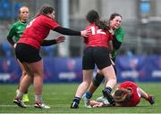 16 April 2025; Amy O'Brien of South East is tackled by Emma O'Rourke of North East during the BearingPoint Sarah Robinson Cup Round 5 match between North East and South East at Energia Park in Dublin. Photo by Shauna Clinton/Sportsfile
