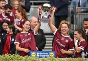 12 April 2025; Kate Thompson of Galway, left, and teammate Aoibhinn Eilian celebrates with the cup after their side's victory in the Lidl Ladies National Football League Division 2 final match between Cork and Galway at Croke Park in Dublin. Photo by Sam Barnes/Sportsfile