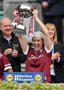 12 April 2025; Shauna Hynes of Galway celebrates with the cup after her side's victory in the Lidl Ladies National Football League Division 2 final match between Cork and Galway at Croke Park in Dublin. Photo by Sam Barnes/Sportsfile