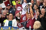 12 April 2025; Kate Geraghty of Galway is lifts the cup alongside Uachtarán Cumann Peil Gael na mBan, Trina Murray, after her side's victory in the Lidl Ladies National Football League Division 2 final match between Cork and Galway at Croke Park in Dublin. Photo by Sam Barnes/Sportsfile
