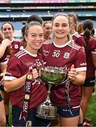 12 April 2025; Galway players Aoife Ní Cheallaigh, left, and Andrea Trill celebrate with the cup after their side's victory in the Lidl Ladies National Football League Division 2 final match between Cork and Galway at Croke Park in Dublin. Photo by Sam Barnes/Sportsfile