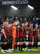 18 April 2025; Bohemians players observe a minute's silence in honour of late player, manager and life-long club member Billy Young before the SSE Airtricity Men's Premier Division match between Bohemians and Cork City at Dalymount Park in Dublin. Photo by Shauna Clinton/Sportsfile