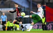 18 April 2025; Dawson Devoy of Bohemians in action against Alex Nolan of Cork City during the SSE Airtricity Men's Premier Division match between Bohemians and Cork City at Dalymount Park in Dublin. Photo by Shauna Clinton/Sportsfile