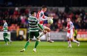 18 April 2025; Chris Forrester of St Patrick's Athletic in action against Matt Healy of Shamrock Rovers during the SSE Airtricity Men's Premier Division match between St Patrick's Athletic and Shamrock Rovers at Richmond Park in Dublin. Photo by Stephen McCarthy/Sportsfile
