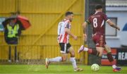 18 April 2025; Michael Duffy of Derry City in action against Greg Cunningham of Galway United during the SSE Airtricity Men's Premier Division match between Galway United and Derry City at Eamonn Deacy Park in Galway. Photo by Piaras Ó Mídheach/Sportsfile