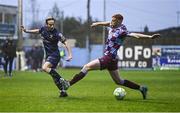 18 April 2025; Harry Wood of Shelbourne in action against James Bolger of Drogheda United during the SSE Airtricity Men's Premier Division match between Drogheda United and Shelbourne at Sullivan & Lambe Park in Drogheda, Louth. Photo by Ben McShane/Sportsfile
