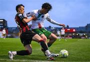 18 April 2025; Archie Meekison of Bohemians in action against Benny Couto of Cork City during the SSE Airtricity Men's Premier Division match between Bohemians and Cork City at Dalymount Park in Dublin. Photo by Shauna Clinton/Sportsfile