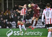 18 April 2025; Sam Todd of Derry City in action against Cian Byrne of Galway United during the SSE Airtricity Men's Premier Division match between Galway United and Derry City at Eamonn Deacy Park in Galway. Photo by Piaras Ó Mídheach/Sportsfile