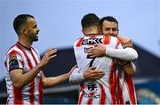 18 April 2025; Danny Mullan of Derry City, right, celebrates with team-mates Michael Duffy, 7, and Robbie Benson after scoring his side's first goalduring the SSE Airtricity Men's Premier Division match between Galway United and Derry City at Eamonn Deacy Park in Galway. Photo by Piaras Ó Mídheach/Sportsfile
