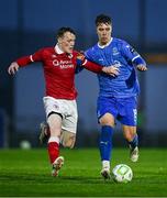 18 April 2025; Tommy Lonergan of Waterford in action against Conor Reynolds of Sligo Rovers during the SSE Airtricity Men's Premier Division match between Waterford and Sligo Rovers at the Regional Sports Centre in Waterford. Photo by Seb Daly/Sportsfile