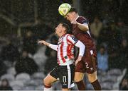18 April 2025; Cian Byrne of Galway United in action against Gavin Whyte of Derry City during the SSE Airtricity Men's Premier Division match between Galway United and Derry City at Eamonn Deacy Park in Galway. Photo by Piaras Ó Mídheach/Sportsfile