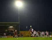 18 April 2025; Moses Dyer of Galway United wins a header above Kevin Holt of Derry City during the SSE Airtricity Men's Premier Division match between Galway United and Derry City at Eamonn Deacy Park in Galway. Photo by Piaras Ó Mídheach/Sportsfile