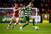 18 April 2025; Darragh Nugent of Shamrock Rovers in action against Brandon Kavanagh of St Patrick's Athletic during the SSE Airtricity Men's Premier Division match between St Patrick's Athletic and Shamrock Rovers at Richmond Park in Dublin. Photo by Stephen McCarthy/Sportsfile
