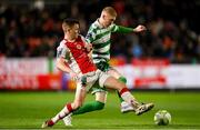 18 April 2025; Darragh Nugent of Shamrock Rovers in action against Brandon Kavanagh of St Patrick's Athletic during the SSE Airtricity Men's Premier Division match between St Patrick's Athletic and Shamrock Rovers at Richmond Park in Dublin. Photo by Stephen McCarthy/Sportsfile