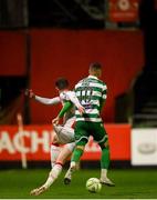 18 April 2025; Chris Forrester of St Patrick's Athletic in action against Graham Burke of Shamrock Rovers during the SSE Airtricity Men's Premier Division match between St Patrick's Athletic and Shamrock Rovers at Richmond Park in Dublin. Photo by Stephen McCarthy/Sportsfile