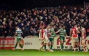 18 April 2025; (EDITORS NOTE: Image contains profanity) St Patrick's Athletic supporters on the Camac Terrace express their opinion towards Lee Grace of Shamrock Rovers, left, during the SSE Airtricity Men's Premier Division match between St Patrick's Athletic and Shamrock Rovers at Richmond Park in Dublin. Photo by Stephen McCarthy/Sportsfile