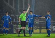 18 April 2025; Referee Aaron O'Dowd shows a red card to Kyle White of Waterford, right, during the SSE Airtricity Men's Premier Division match between Waterford and Sligo Rovers at the Regional Sports Centre in Waterford. Photo by Seb Daly/Sportsfile