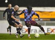 18 April 2025; Thomas Oluwa of Drogheda United in action against Mark Coyle of Shelbourne during the SSE Airtricity Men's Premier Division match between Drogheda United and Shelbourne at Sullivan & Lambe Park in Drogheda, Louth. Photo by Ben McShane/Sportsfile